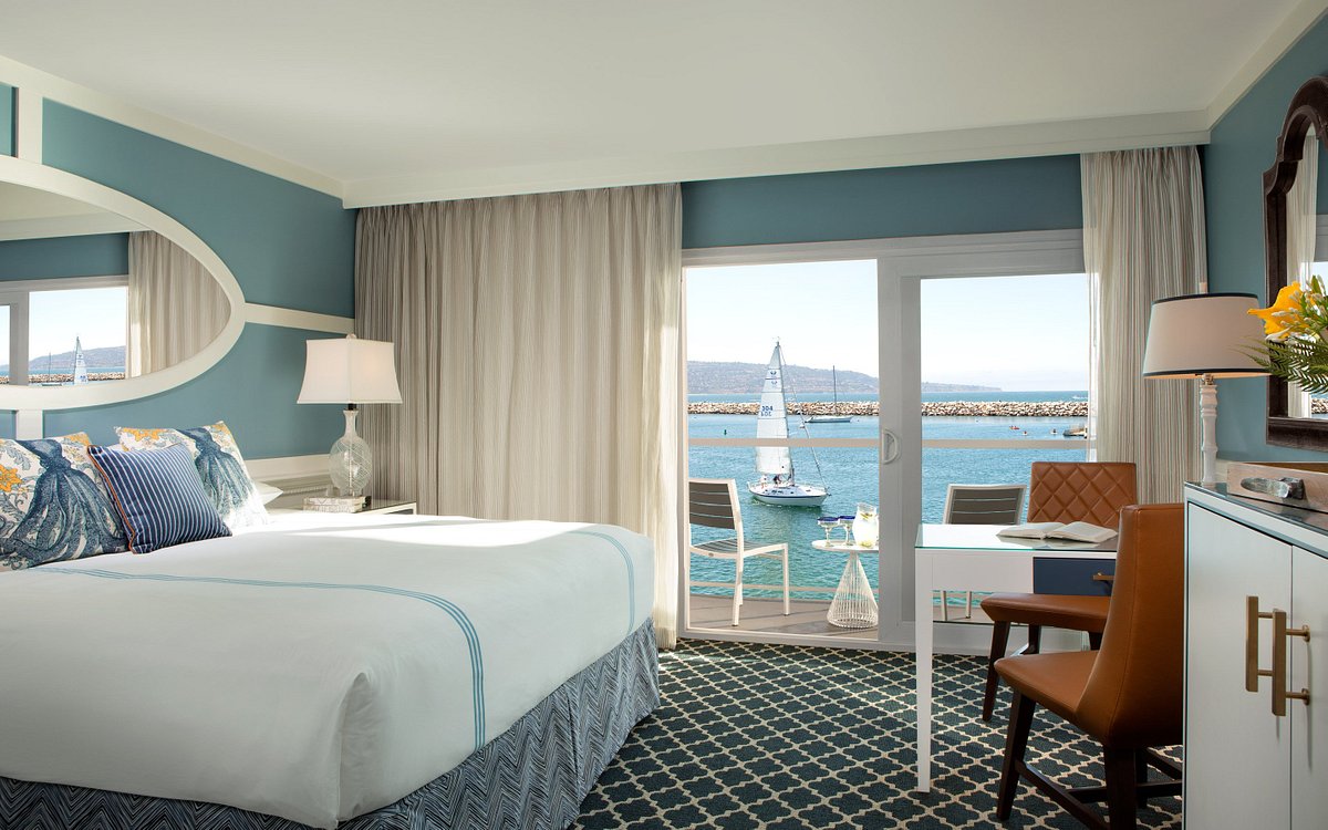 A hotel room with a view of the marina